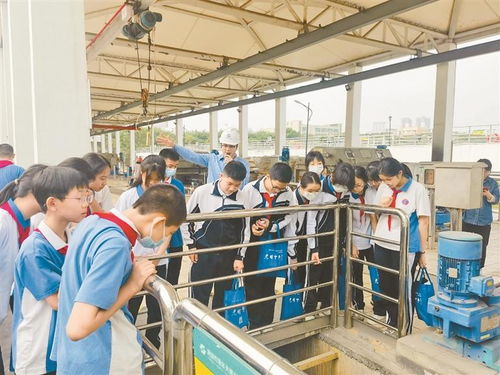 光明中学52名师生走进水质净化厂及湿地公园参观学习